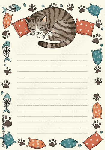 A whimsical notepad with a cute sleeping cat and a decorative frame of fish images and paw prints
