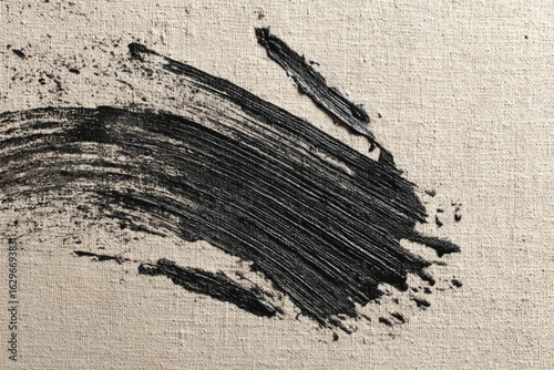 Black paint stroke on canvas texture close up eps