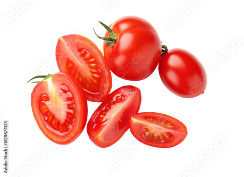 Fresh ripe whole and sliced tomatoes isolated on black background healthy organic food image