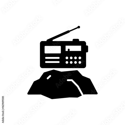  Portable radio on rock seaside music black filled icon