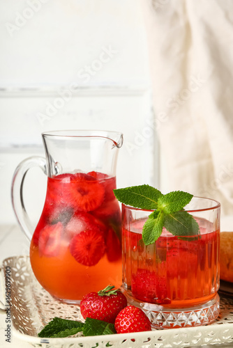 Jug and glass of infused wa...