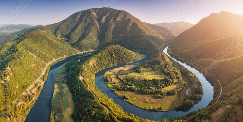 Photos Aerial view of a Western Morava winding river snaking through a picturesque Ovca
