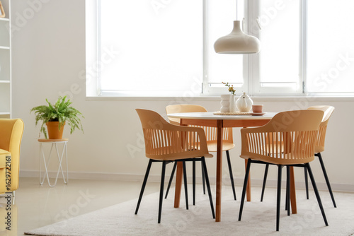 Принти на полотні Dinning table with chairs in room