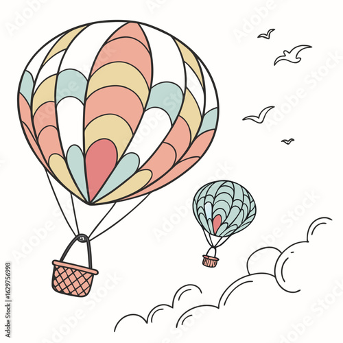 Two colorful hot air balloons float peacefully in the sky with birds and clouds