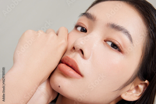 Close-Up Portrait of a Young Asian Woman.