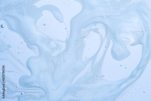Fluid abstract pattern of light blue swirls with air bubbles. Clean and versatile background for modern concepts. Airy and flowing composition with micro bubbles