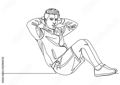 Young man doing sit-ups, a core-strengthening exercise for abdominal muscles.