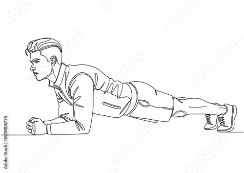 Young man in an elbow plank, a core-strengthening bodyweight exercise.