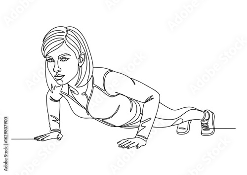 Young woman doing a push-up, a common bodyweight exercise for full-body strength.