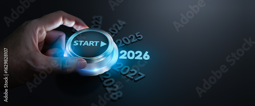 happy new year 2026,Finger about to twist the start button 2026 with the text 2024,2025,2026 and start on twist button.Concept of planning,start,career path,business strategy,opportunity and change