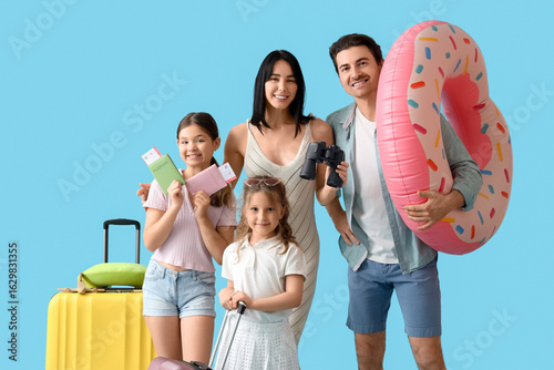 Family of tourists with swi...