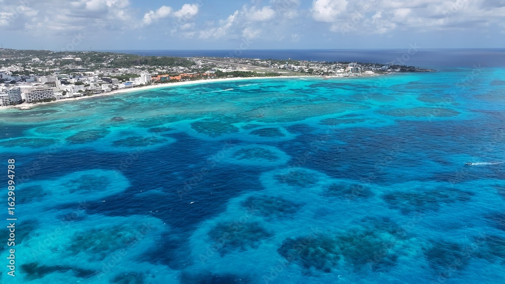 Obraz premium San Andres Skyline In San Andres Providencia Y Santa Catalina Colombia. Turquoise Water Caresses Tropical Beach In A Caribbean. Shore Clouds Sky Beach Sea. Seaside Panorama.
