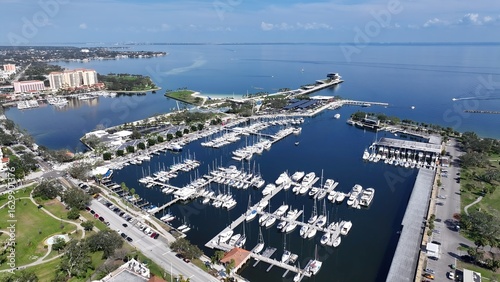 St. Pete Pier In Saint Petersburg Florida United States. Aerial View Of Stunning Beach With Crystal Clear Waters. Business Sky Downtown Cityscape. Business Backgrounds Panorama.