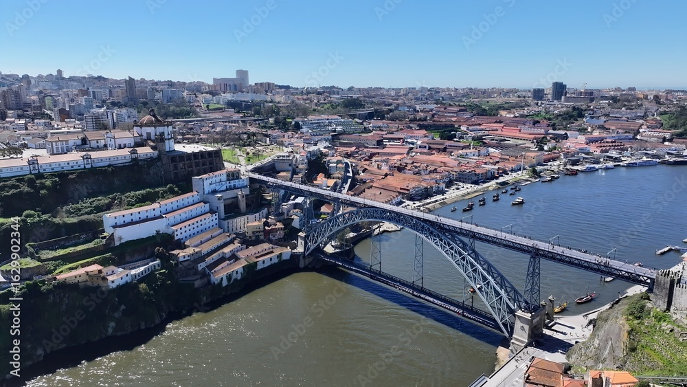 Obraz premium Porto Skyline In Porto Portugal. Birds Eye View Of Stunning Dark River And Forest Trees. Industry Skyline Commercial Building Awesome. Commercial Building Architecture Business. Porto Portugal.
