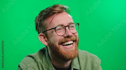 video of a senior man smiling and wearing glasses green screen 