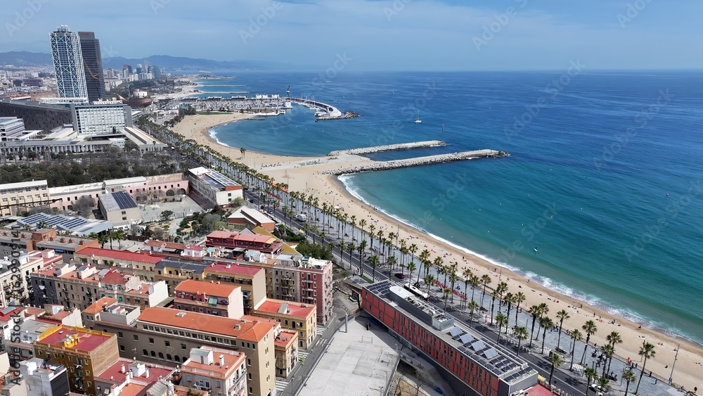 Fototapeta premium Barceloneta Beach In Barcelona Catalonia Spain. Stunning Tropical Coastline Beach Scene Viewed From Above. Paradise Skyline Grateful Vibrant. Paradise Sea. Barcelona Catalonia.
