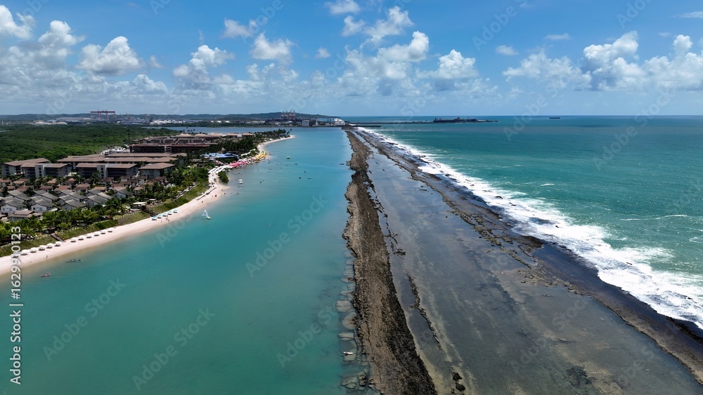 Fototapeta premium Northeastern Brazil Skyline In Port Of Chickens Pernambuco Brazil. Bird Eye View Of A Amazing Coastal Beach In The Summer Holiday. Shore Sky Clouds Beach Sea. Seaside Panorama.