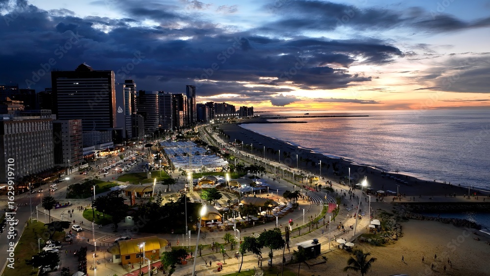 Naklejka premium Sunset Beach In Fortaleza Ceara Brazil. Bird Eye View Of A Amazing Coastal Beach In The Summer Holiday. Building Industry Skyline Birds View Vibrant. Sunset. Fortaleza Ceara.