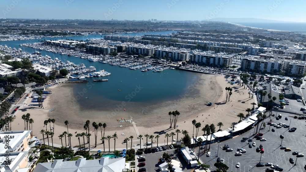 Naklejka premium Venice In Los Angeles California United States. Turquoise Ocean Waves Gently Crashing On Tropical Beach. Coast Clouds Seaside Summertime. Coast International Beach Panorama. Los Angeles California.