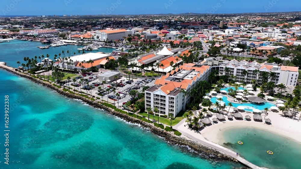 Obraz premium Scenic Island In Oranjestad Caribbean Netherlands Aruba. Bird Eye View Of A Amazing Coastal Beach In The Summer Holiday. Metropolitan Landscape Commercial Building Amazing.