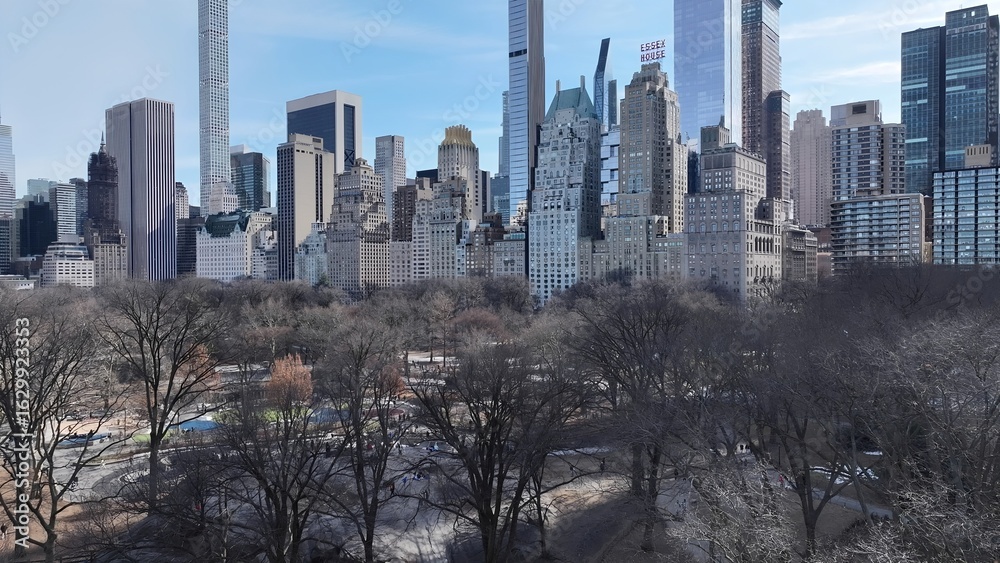 Fototapeta premium Central Park In Manhattan New York United States. Bird Eye View Of Stunning Iconic Recreational Park Of The City. Metropole Landscape Company Building Vibrant. Metropole Corporate Town.