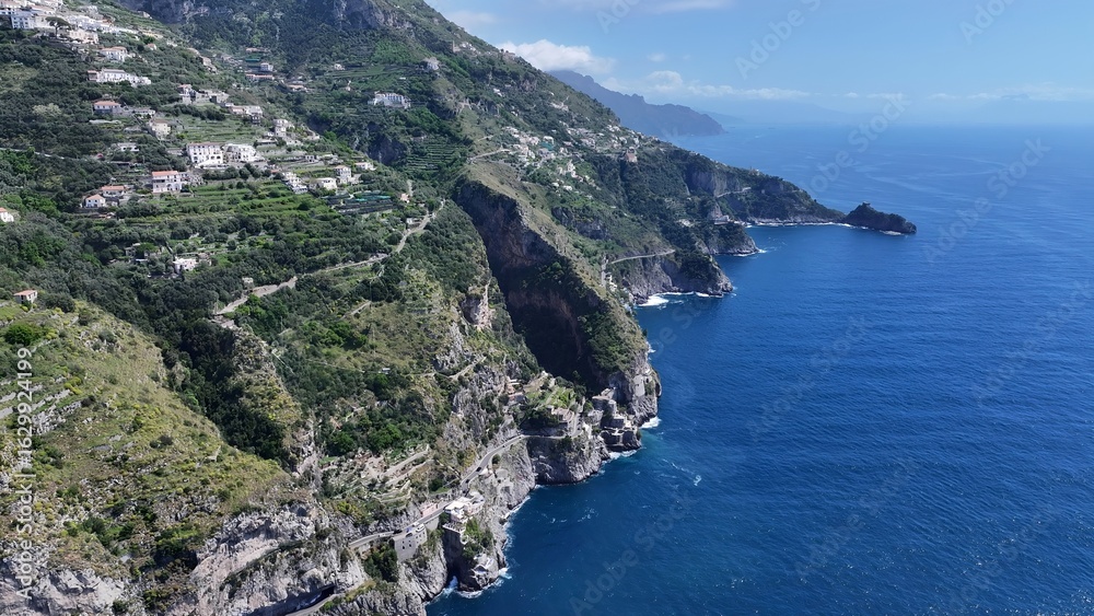 Amalfi Coast In Amalfi Salerno Italy. Stunning Tropical Coastline Beach Scene Viewed From Above. Coast Horizon Seaside Summertime. Coast Panoramic. Amalfi Salerno. Amalfi Coast In Amalfi Salerno Italy. Stunning Tropical Coastline Beach Scene Viewed From Above. Coast Horizon Seaside Summertime. Coast Panoramic. Amalfi Salerno.