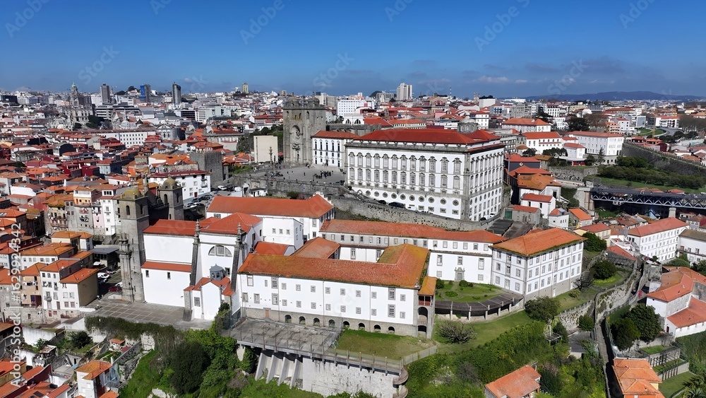 Obraz premium Se Do Porto In Porto Portugal. Stunning Baroque Church Contrasts With The Landscape . Town Clouds Sky Backgrounds Urban. Backgrounds Downtown Panoramic City. Porto Portugal.