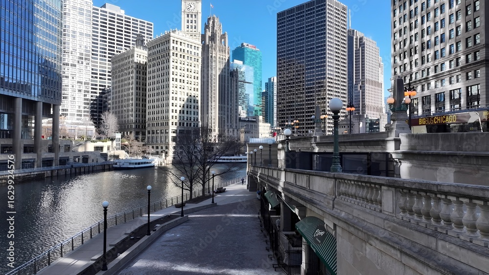 Obraz premium Chicago Riverwalk In Chicago Illinois United States. Amazing Skysrapers And Traffic On Street Viewed From Above. Business Sky Background Downtown Cityscape. Outdoor Downtown Panning Wide.