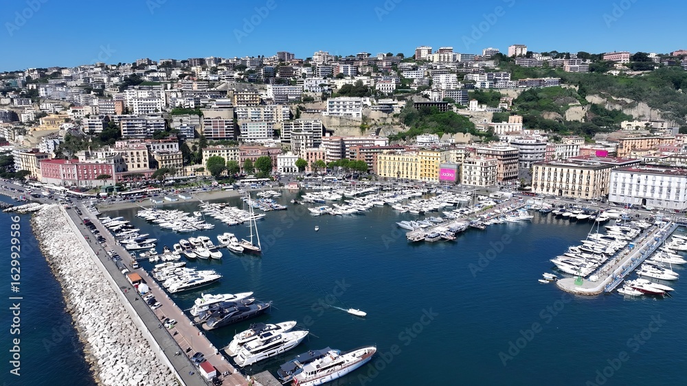 Naples Skyline In Naples Campania Italy. Breathtaking Aerial View Of Boat Sailing In A Wonder Scene. Infrastructure Landscape Company Building Stunning. Infrastructure Urban. Naples Campania. Naples Skyline In Naples Campania Italy. Breathtaking Aerial View Of Boat Sailing In A Wonder Scene. Infrastructure Landscape Company Building Stunning. Infrastructure Urban. Naples Campania.
