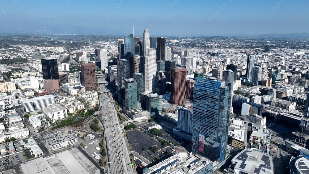 Fototapeta premium Corporate Buildings In Los Angeles California United States. Bustling Downtown Cityscape With Modern Buildings. Business Clouds Sky Downtown Cityscape. Backgrounds Panoramic. Los Angeles California.