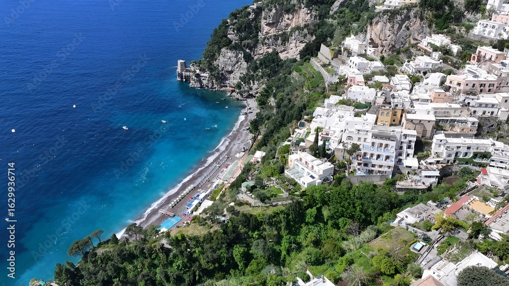 Fototapeta premium Amalfi Coast In Positano Salerno Italy. Bird Eye View Of A Amazing Coastal Beach In The Summer Holiday. Shore Clouds Sky Beach Sea. Seaside Panorama. Positano Salerno.