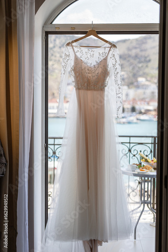 wedding dress on the window