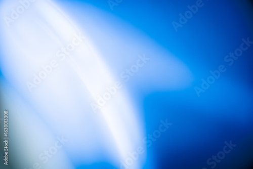 Abstract blue and white blurred light background. Blurred motion gradient mix color background. Ideal for use in creative design, marketing materials, tech visuals, and modern graphic art projects