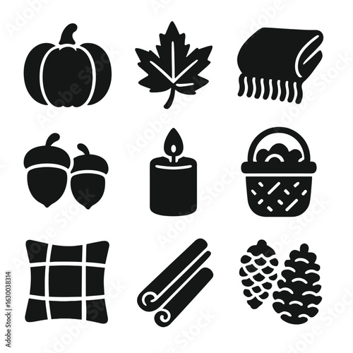 Fall Décor Icons. Solid, filled icons set of fall home décor: pumpkin, autumn leaves, cozy blanket, acorns,
