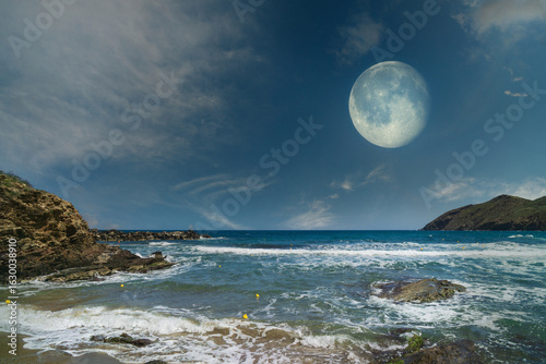 Obraz na płótnie Impact of sea weather and climate changes on coastal landscapes during moonlit n