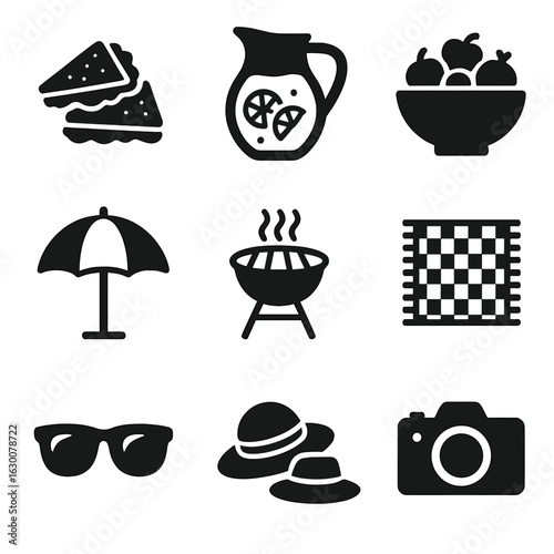 Picnic Essentials Icons. Solid, filled icons set of group picnic items: sandwiches, lemonade pitcher, fruit