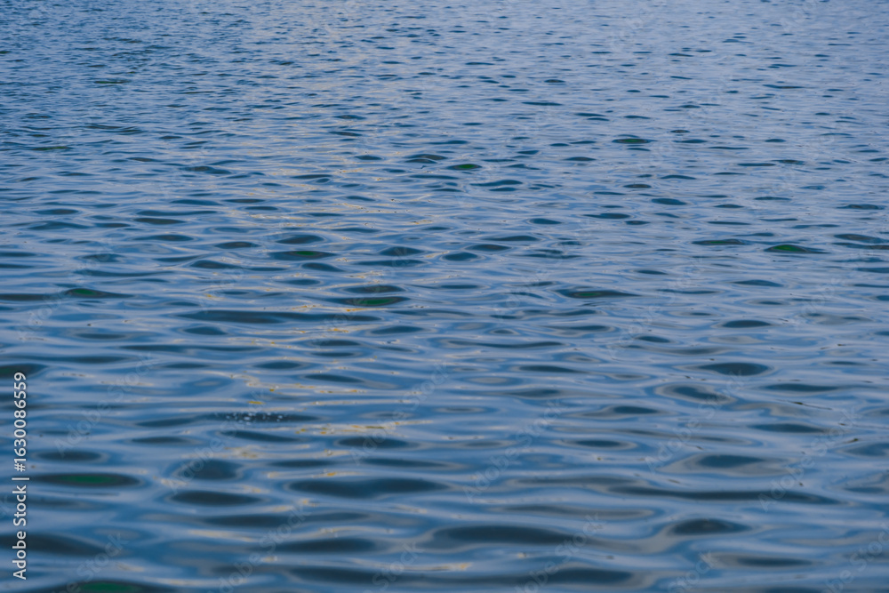 Naklejka premium deep blue sea surface with wave by the heavy wind with many white bubble