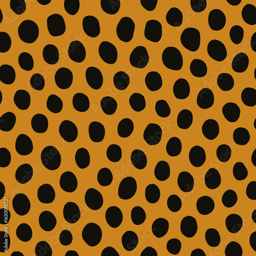 Seamless cheetah print pattern. Classic and trendy animal skin texture with distinctive black spots on warm beige background, perfect for fashion and decor. Vector animalistic print, animal skin.