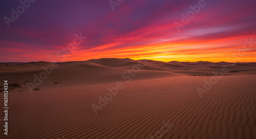 Desert landscape sunset sand dunes scenic view travel destination nature photography orange and purple sky