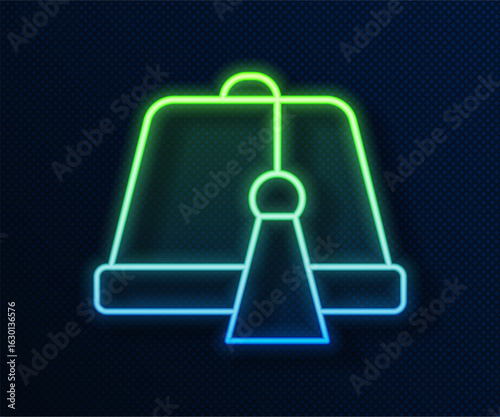 Glowing neon line Turkish hat icon isolated on blue background. Vector