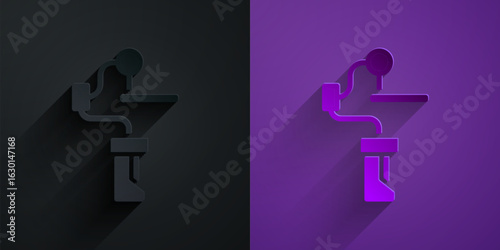 Paper cut Gimbal stabilizer for camera icon isolated on black on purple background. Paper art style. Vector