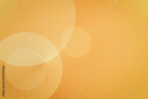 Abstract orange gradient background with overlapping circular geometric shapes and grainy texture. Great for creative projects or presentation designs