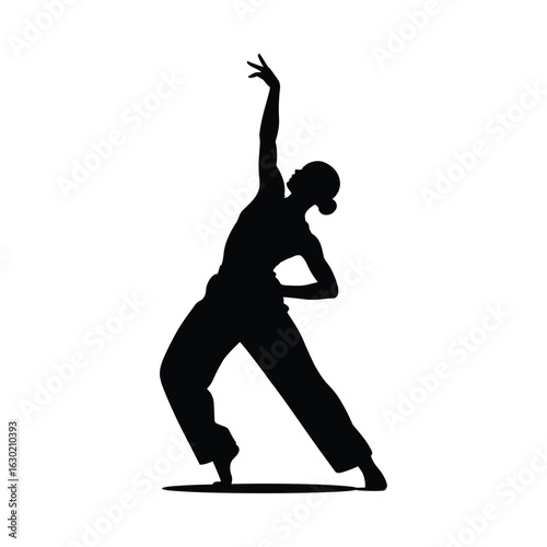 Silhouette of a graceful dancer in a dynamic pose