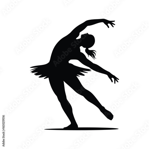 Silhouette of a graceful ballerina performing a dynamic dance move