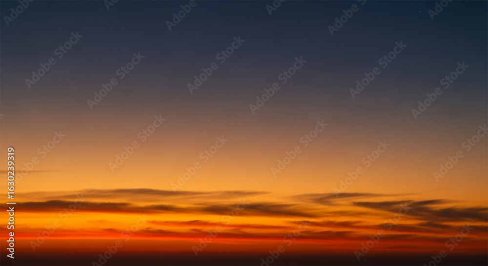 Fototapeta premium Sunset gradient with warm orange fading to navy