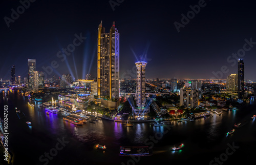 Wallpaper Mural Modern buildings in the city with water reflection, firework, light show at night time. Torontodigital.ca