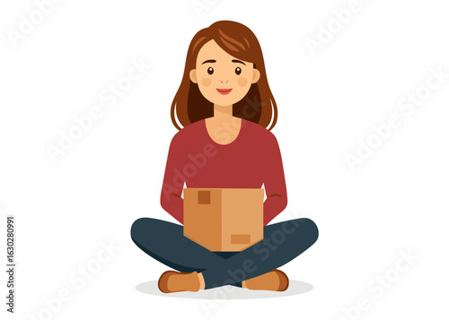 Woman sitting cross legged holding a package