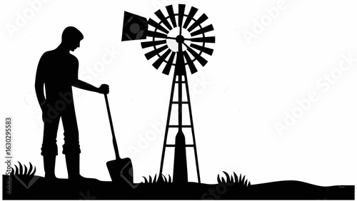 Silhouette of a farmer with a shovel next to a windmill in a field against a white background scene
