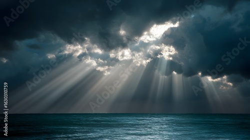 Dramatic cloudy sky with sunlight piercing