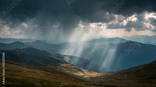 Distant mountain peaks under dramatic sky